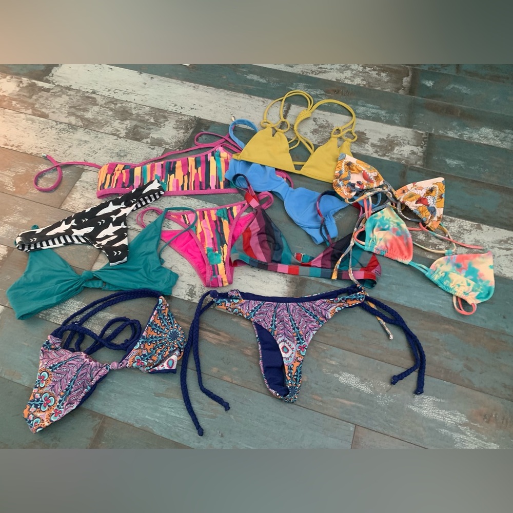 Assortment of bikinis: Moana, Acacia, Bydee, Billabong, & local bikini designer
